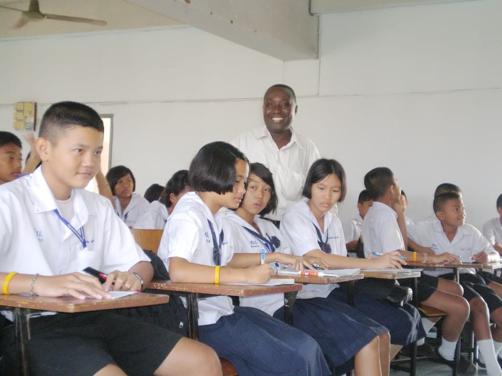 Teacher and students in the classroom-5 Silent Battles That Break Teachers No One Talks About.