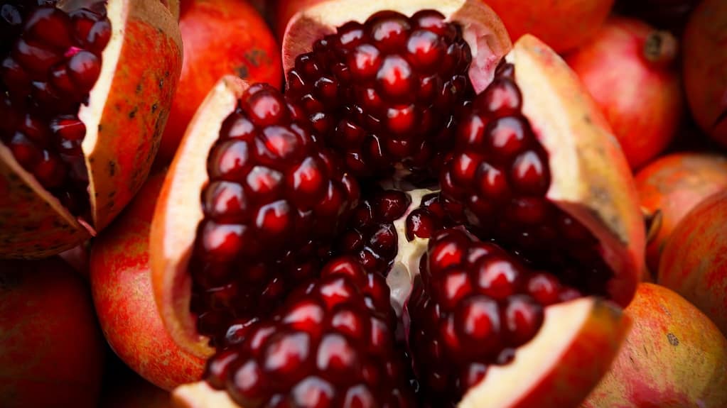 close-up photo of sliced pomegranate-another way to lower high blood pressure.