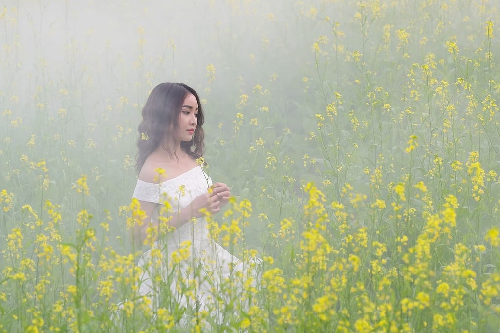 portrait of a girl on a foggy day among wild flowers-the amazing healing power of nature you should know