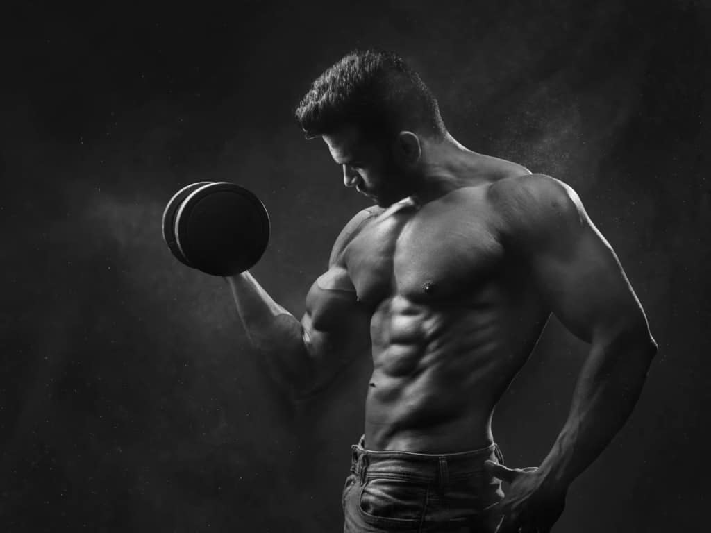 An image of a man training with a barbell
