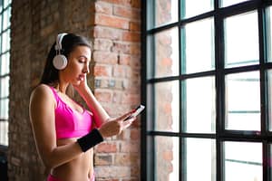 a young lady wearing headphones